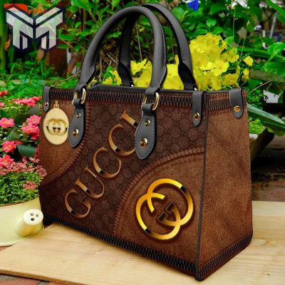 Experience luxury with Gucci golden brown small handbag, buy now for a stylish statement piece!